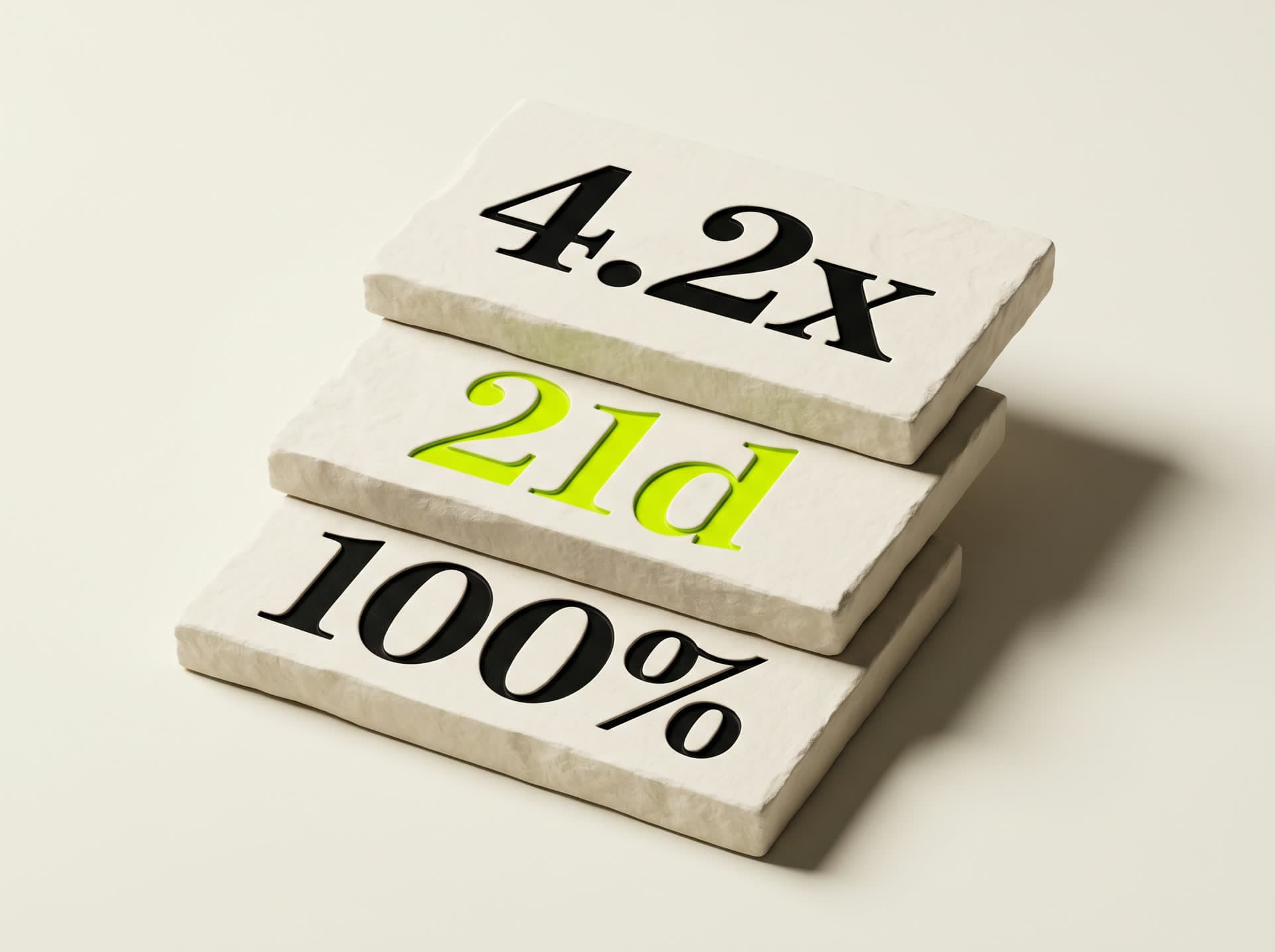 Stack of cream stone tablets with numbers debossed, one filled with acid-lime ink